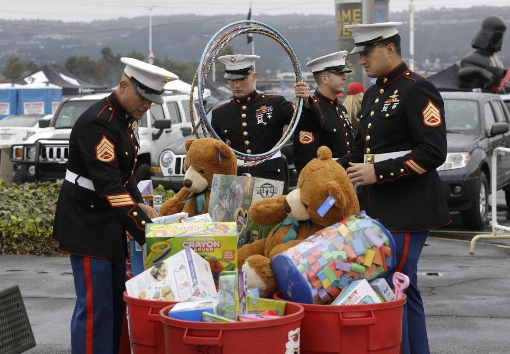 USMC soldiers gathering toys for their Toys for Tots program.