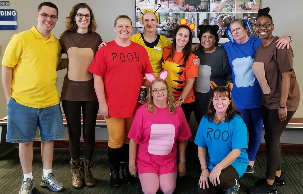 Office for Finance Halloween group costume as Winnie the Pooh characters