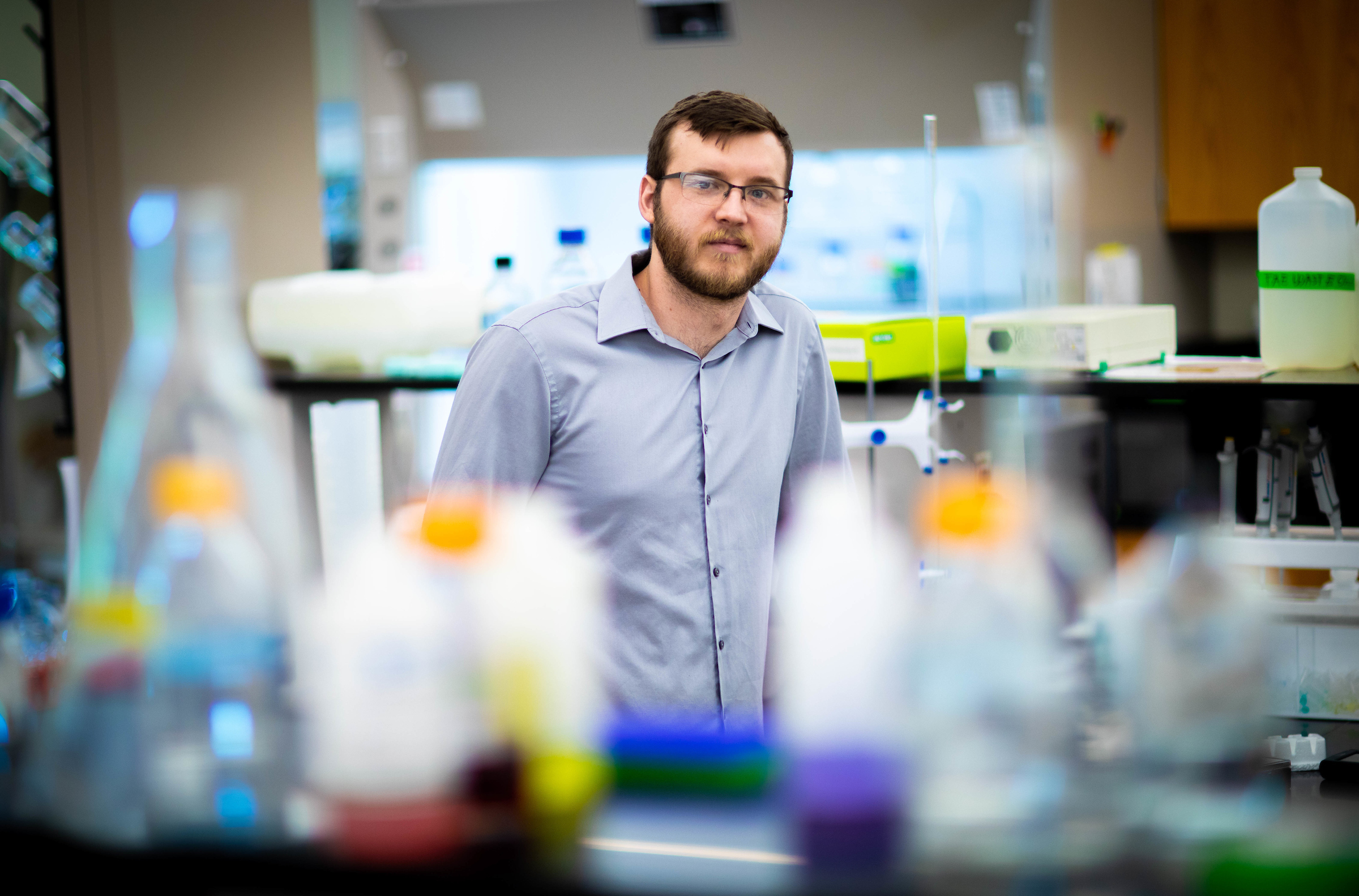 Santa Fe College graduate Clay Abraham photographed in a lab at the Perry Center for emerging technologies