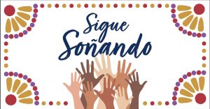 Several hands reaching up toward the words "Sigue Soñando."