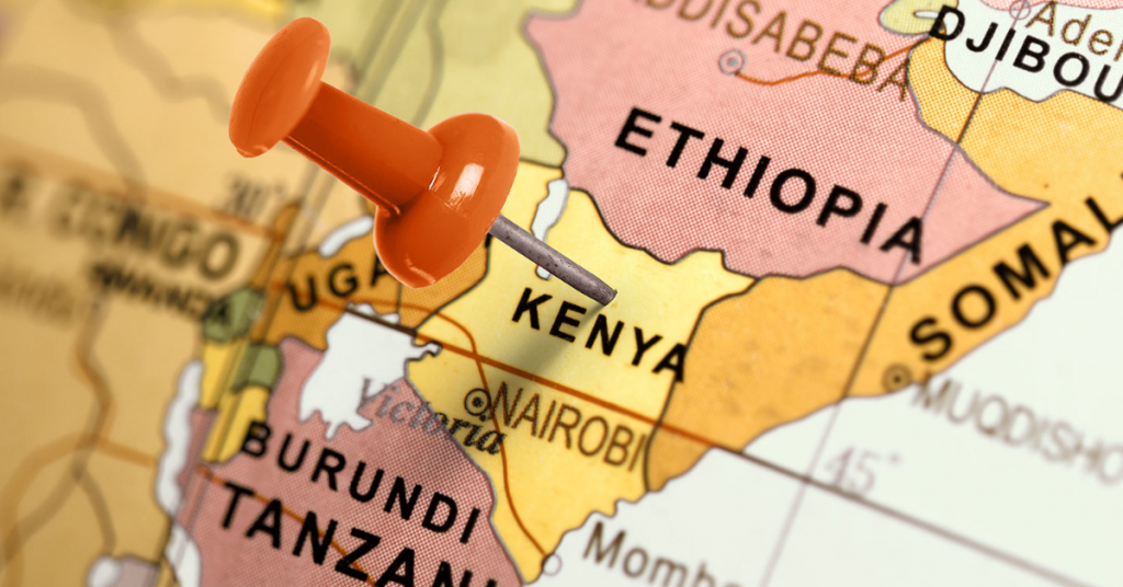 Map of Africa with push pin inserted over the country Kenya.