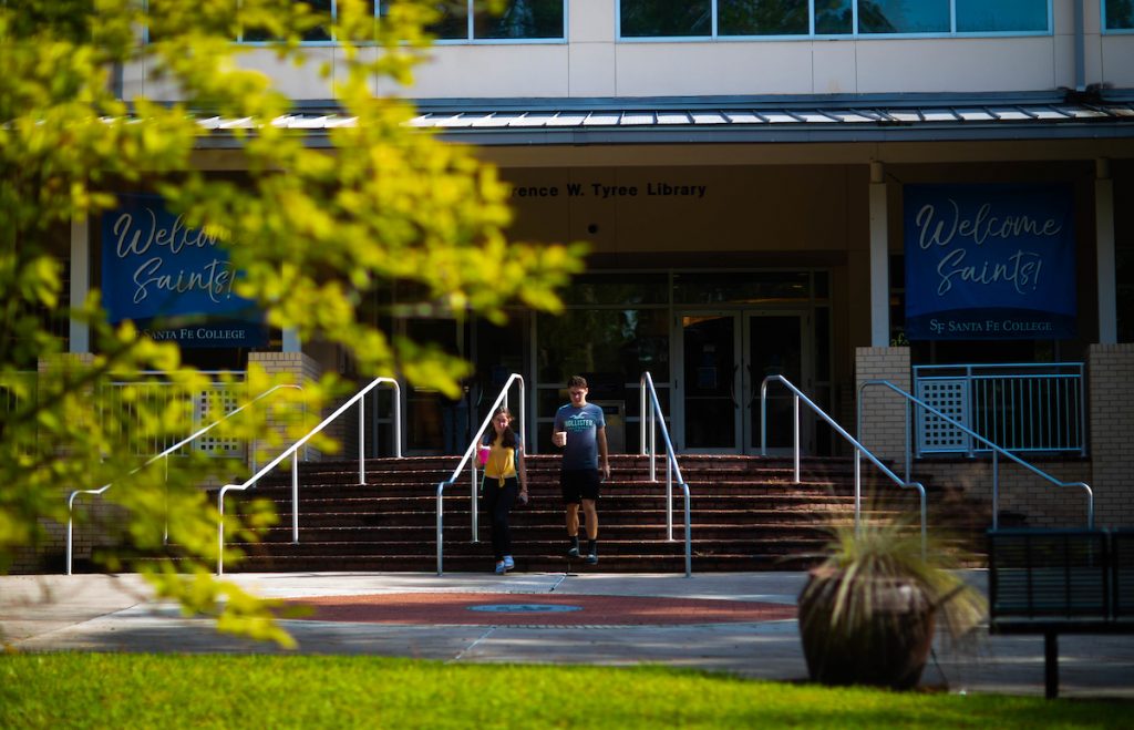Students leave the Lawrence Tyree Library on Sante Fe College's Northwest Campus.
