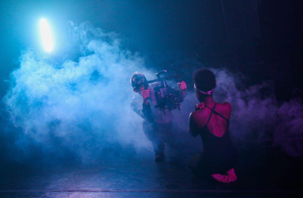 SF Dance students practice using fog and lights