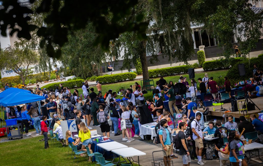 A crowd of students participate in Santa Fe College Student Life' Club Rush on the Oak Grove at the Northwest Campus.