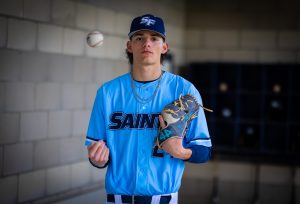 Santa Fe College Saints Baseball player Matthew Jenkins tosses a baseball up in the air