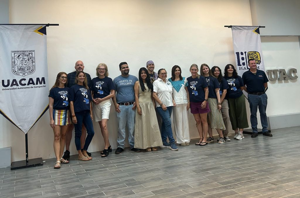 A group of people standing in a room